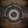 LDS Argentina Buenos Aires South Mission Christmas Ornament laying on a Wooden Background
