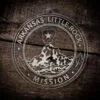 LDS Arkansas Little Rock Mission Christmas Ornament laying on a Wooden Background