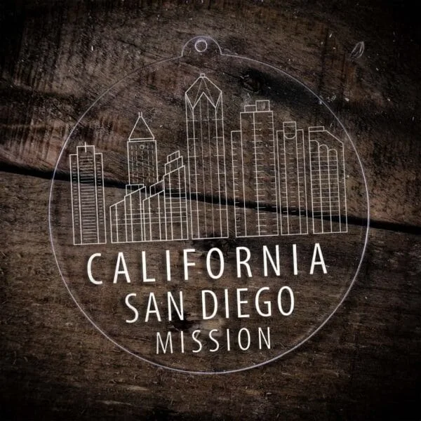 LDS California San Diego Mission Christmas Ornament laying on a Wooden Background
