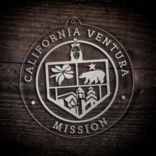 LDS California Ventura Mission Christmas Ornament laying on a Wooden Background