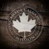 LDS Canada Calgary Mission Christmas Ornament laying on a Wooden Background
