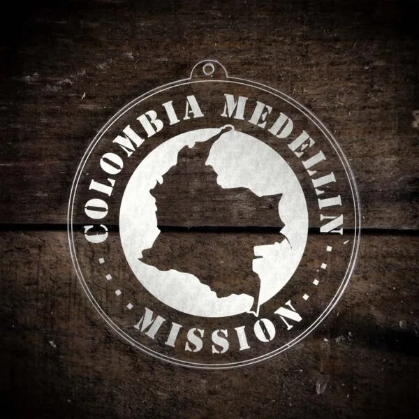 LDS Colombia Medellin Mission Christmas Ornament laying on a Wooden Background