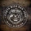 LDS Costa Rica San José West Mission Christmas Ornament laying on a Wooden Background