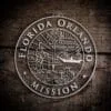 LDS Florida Orlando Mission Christmas Ornament laying on a Wooden Background