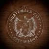 LDS Guatemala Guatemala City East Mission Christmas Ornament laying on a Wooden Background