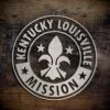 LDS Kentucky Louisville Mission Christmas Ornament laying on a Wooden Background