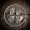 LDS Maryland Baltimore Mission Christmas Ornament laying on a Wooden Background