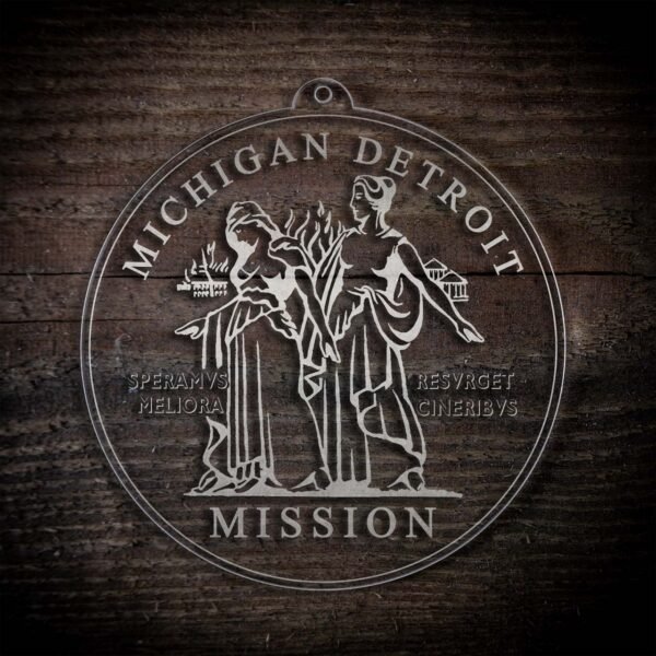 LDS Michigan Detroit Mission Christmas Ornament laying on a Wooden Background