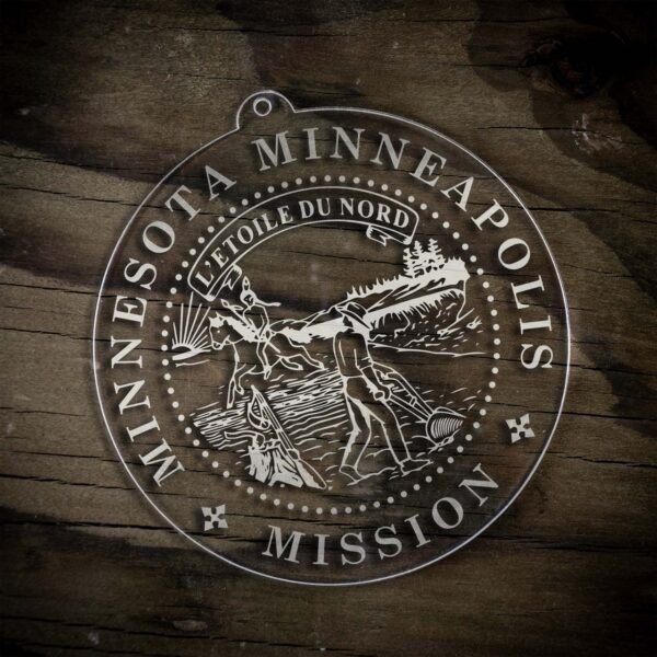 LDS Minnesota Minneapolis Mission Christmas Ornament laying on a Wooden Background