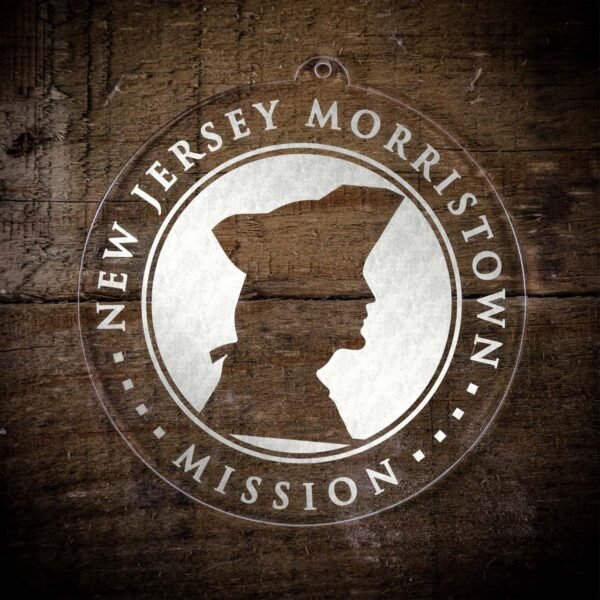LDS New Jersey Morristown Mission Christmas Ornament laying on a Wooden Background