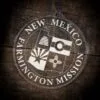LDS New Mexico Farmington Mission Christmas Ornament laying on a Wooden Background