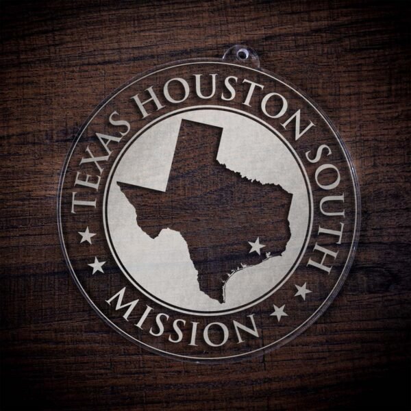 LDS Texas Houston South Mission Christmas Ornament laying on a Wooden Background