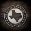 LDS Texas San Antonio Mission Christmas Ornament laying on a Wooden Background