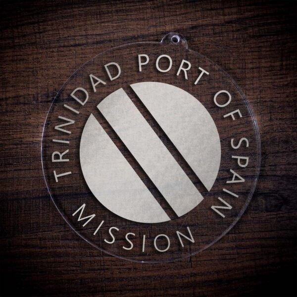 LDS Trinidad Port of Spain Mission Christmas Ornament laying on a Wooden Background