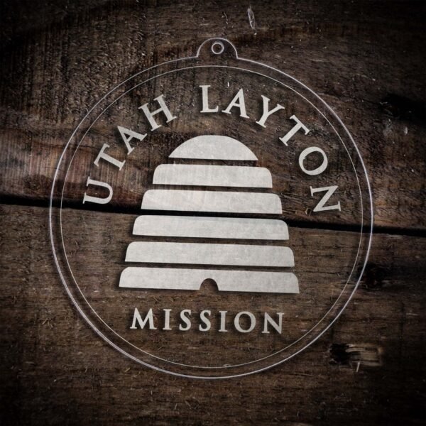 LDS Utah Layton Mission Christmas Ornament laying on a Wooden Background