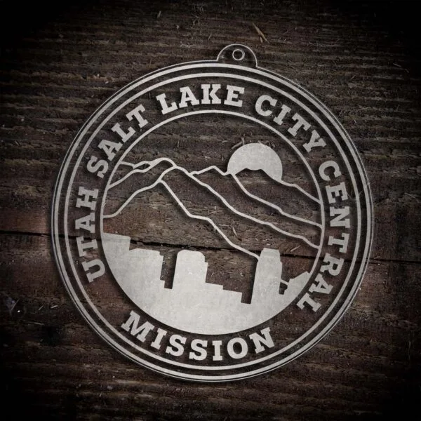 LDS Utah Salt Lake City Central Mission Christmas Ornament laying on a Wooden Background