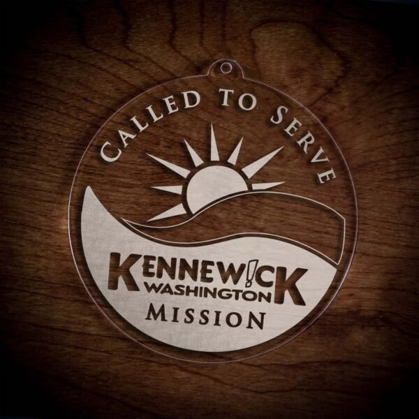 LDS Washington Kennewick Mission Christmas Ornament laying on a Wooden Background