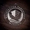 LDS Washington Vancouver Mission Christmas Ornament laying on a Wooden Background