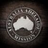 LDS Australia Adelaide Mission Christmas Ornament laying on a Wooden Background