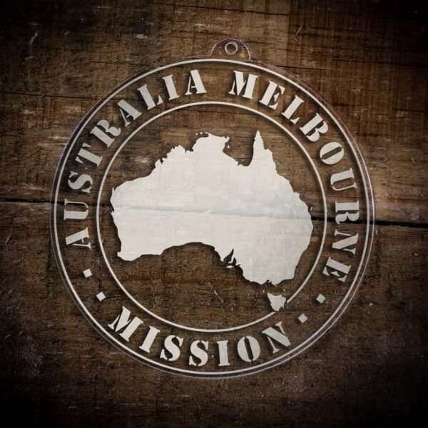 LDS Australia Melbourne Mission Christmas Ornament laying on a Wooden Background