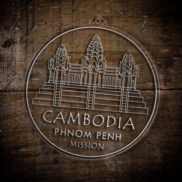 LDS Cambodia Phnom Penh Mission Christmas Ornament laying on a Wooden Background
