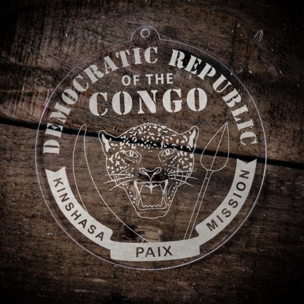 LDS Democratic Republic of the Congo Kinshasa Mission Christmas Ornament laying on a Wooden Background