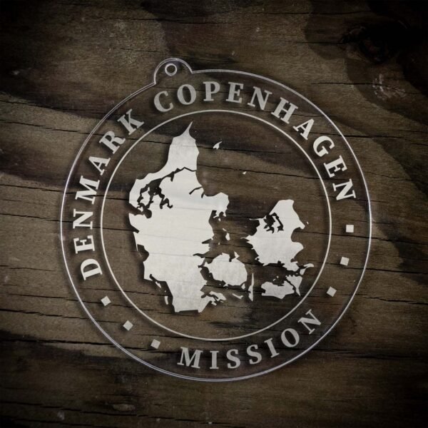 LDS Denmark Copenhagen Mission Christmas Ornament laying on a Wooden Background
