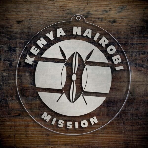 LDS Kenya Nairobi Mission Christmas Ornament laying on a Wooden Background