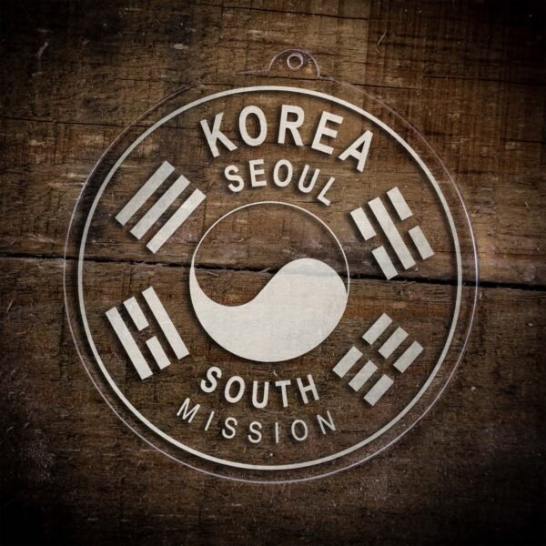 LDS Korea Seoul South Mission Christmas Ornament laying on a Wooden Background