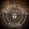 LDS Nigeria Lagos Mission Christmas Ornament laying on a Wooden Background