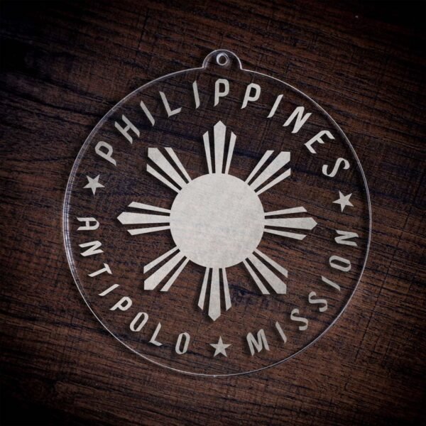 LDS Philippines Antipolo Mission Christmas Ornament laying on a Wooden Background