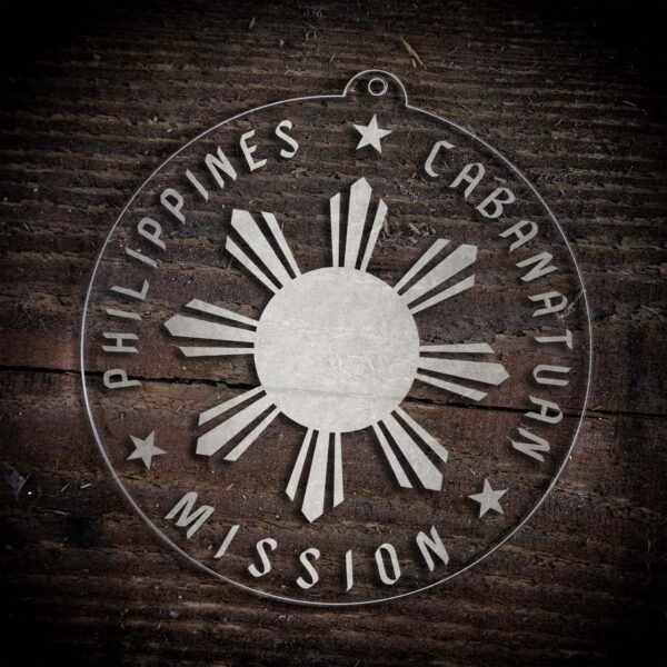 LDS Philippines Cabanatuan Mission Christmas Ornament laying on a Wooden Background