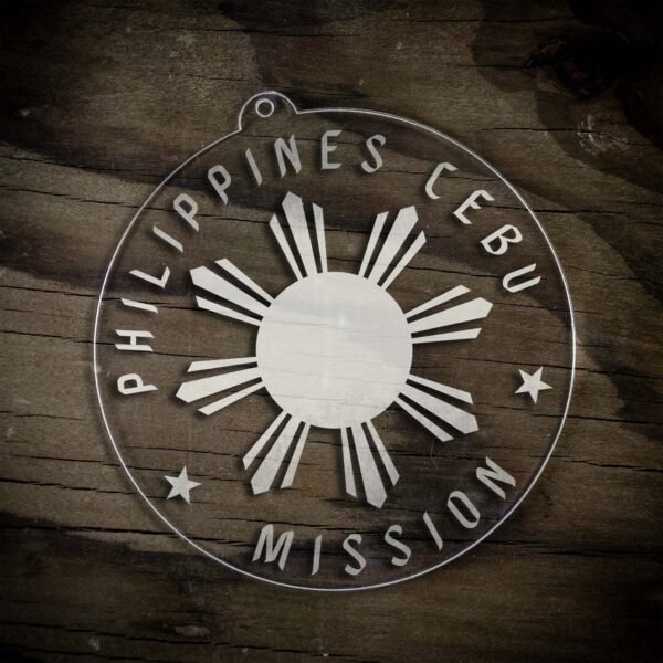LDS Philippines Cebu Mission Christmas Ornament laying on a Wooden Background