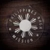 LDS Philippines Naga Mission Christmas Ornament laying on a Wooden Background