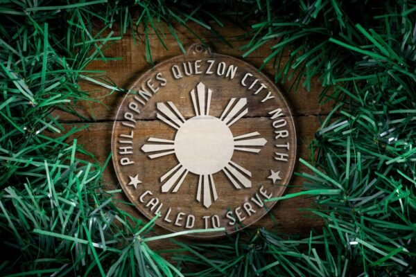 LDS Philippines Quezon City North Mission Christmas Ornament surrounded by a Simple Reef