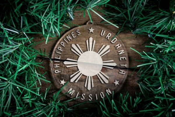 LDS Philippines Urdaneta Mission Christmas Ornament surrounded by a Simple Reef