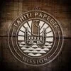 LDS Tahiti Papeete Mission Christmas Ornament laying on a Wooden Background