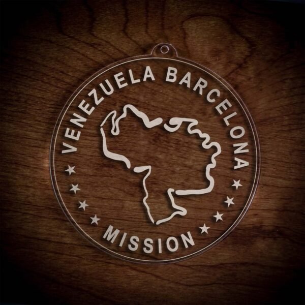LDS Venezuela Barcelona Mission Christmas Ornament laying on a Wooden Background