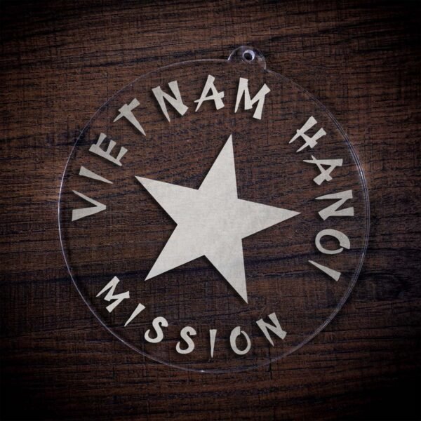 LDS Vietnam Hanoi Mission Christmas Ornament laying on a Wooden Background