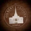 LDS Gilbert Arizona Temple Christmas Ornament laying on a Wooden Background