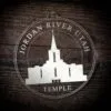 LDS Jordan River Utah Temple Christmas Ornament laying on a Wooden Background