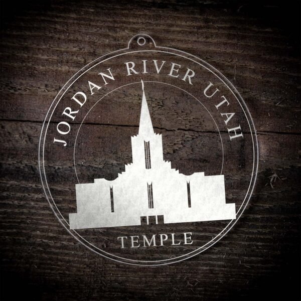 LDS Jordan River Utah Temple Christmas Ornament laying on a Wooden Background