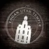 LDS Logan Utah Temple Christmas Ornament laying on a Wooden Background