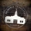 LDS Memphis Tennessee Temple Christmas Ornament laying on a Wooden Background
