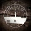 LDS Monticello Utah Temple Christmas Ornament laying on a Wooden Background