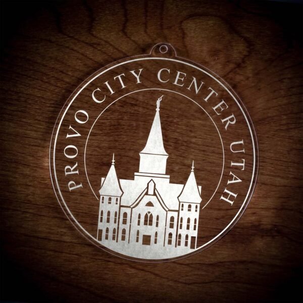 LDS Provo City Center Temple Christmas Ornament laying on a Wooden Background