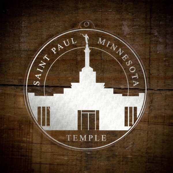 LDS Saint Paul Minnesota Temple Christmas Ornament laying on a Wooden Background