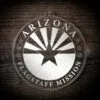 LDS Arizona Flagstaff Mission Christmas Ornament laying on a Wooden Background