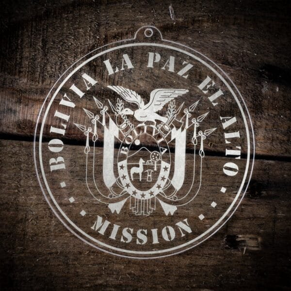 LDS Bolivia La Paz El Alto Mission Christmas Ornament laying on a Wooden Background