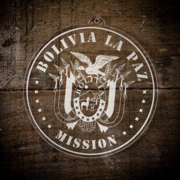 LDS Bolivia La Paz Mission Christmas Ornament laying on a Wooden Background